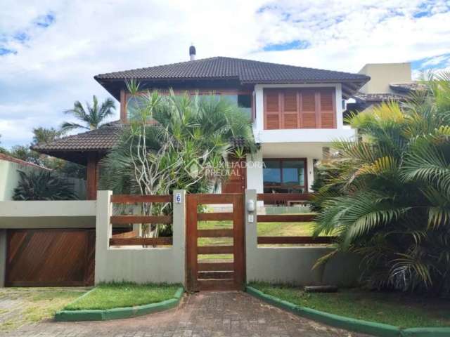 Casa em condomínio fechado com 4 quartos para alugar na Rua Vereador Osni Ortiga, 3177, Lagoa da Conceição, Florianópolis, 365 m2 por R$ 13.900