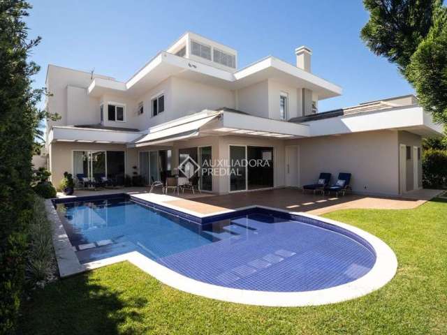 Casa com 4 quartos à venda na Avenida dos Dourados, 210, Jurerê Internacional, Florianópolis, 470 m2 por R$ 7.700.000