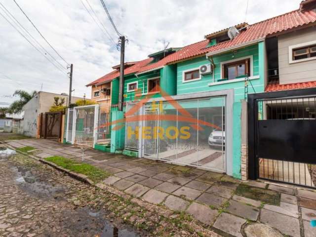 Casa com 3 quartos à venda na Rua dos Guenoas, 897, Guarujá, Porto Alegre por R$ 420.000