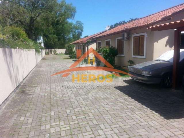 Casa em condomínio fechado com 2 quartos à venda na Rua das Espatódeas, 340, Ponta Grossa, Porto Alegre por R$ 160.000