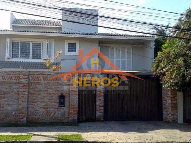 Casa com 6 quartos à venda na Rua Arapei, 228, Cristal, Porto Alegre por R$ 1.200.000