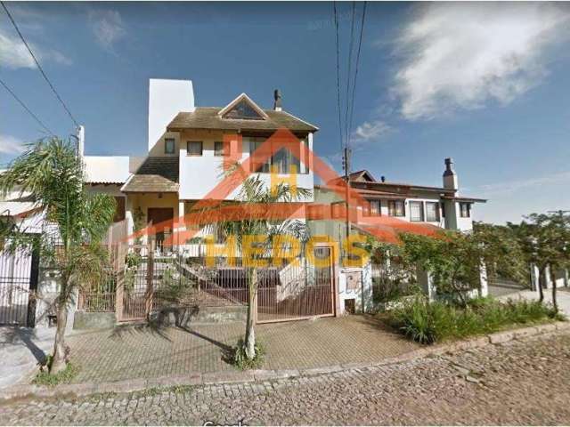 Casa com 3 quartos à venda na Rua Comendador José Júlio de Mello, 184, Teresópolis, Porto Alegre por R$ 1.045.000