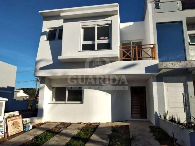 Casa em condomínio fechado com 4 quartos à venda na Rua Jorge Babot Miranda, 680, Aberta dos Morros, Porto Alegre por R$ 748.000