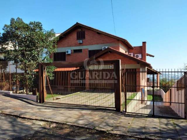 Casa com 6 quartos à venda na Rua Altos da Amapá, 170, Vila Nova, Porto Alegre por R$ 2.800.000