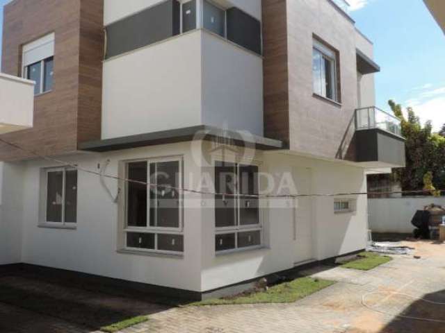 Casa em condomínio fechado com 3 quartos à venda na Rua Paraguá, 54, Vila Assunção, Porto Alegre por R$ 1.150.000
