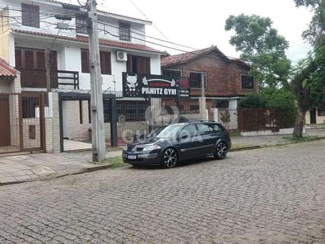 Casa com 3 quartos à venda na Rua Márcio Dias, 360, Nonoai, Porto Alegre por R$ 900.000