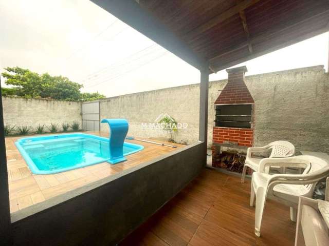 Casa à venda a 260m mar Balneário Ipanema! Área gourmet com piscina, jardim garagem