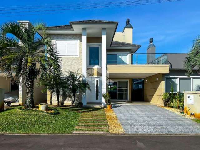 Casa em Condomínio de 4 suites à venda Rua Paraguassú, Atlântida Sul (Distrito) - Atlântida Sul  4 suítes - 6 banheiros