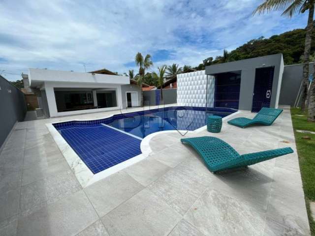 Casa no condomínio Jardim Acapulco com 3 dormitórios