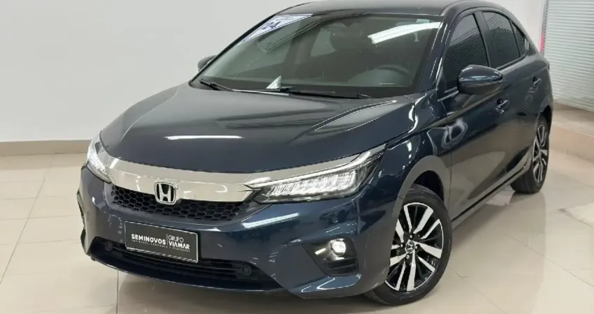 O Honda City Hatch 2023 Touring, com motor 1.5 i-VTEC flex, entrega 126 cv e 15,8 kgfm de torque, o 