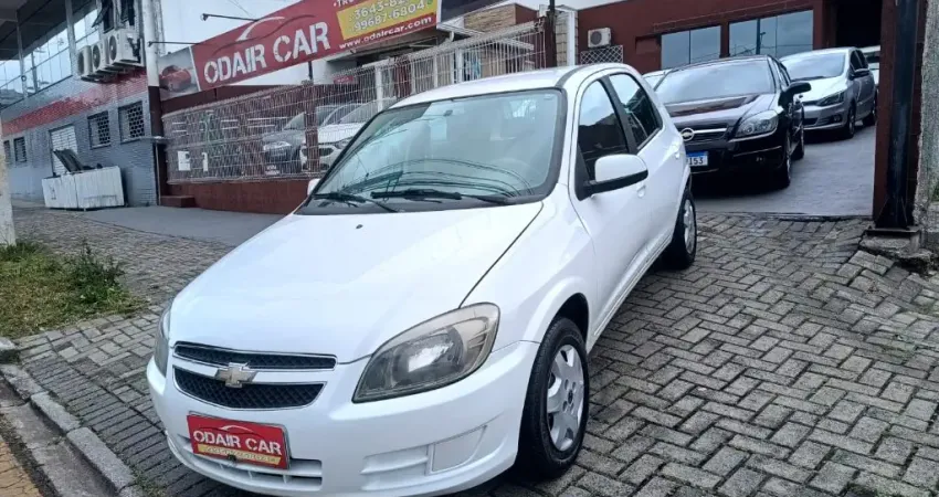 CELTA 1.0 COMPLETO:AIR BAG, ABS, ALARME, AR CONDICIONADO, AR QUENTE, DIREÇÃO HIDRÁULICA, TRAVAS ELÉT
