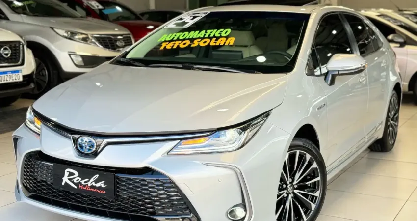 Toyota Corolla Altis Premium 1.8 híbrido CVT com todas revisões feitas e garantia de fábrica 