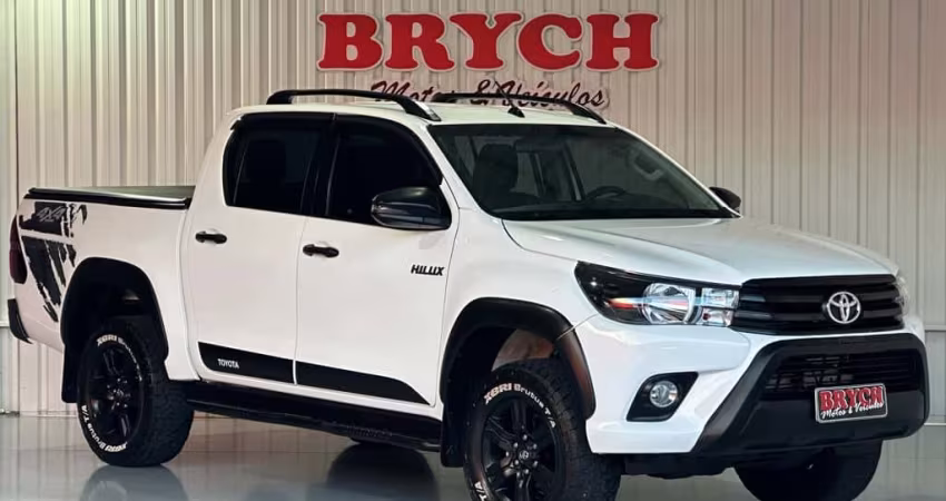 Toyota Hilux CD SR CHALL. 4x4 2.8 TDI Dies Aut.  - Branca - 2018/2018