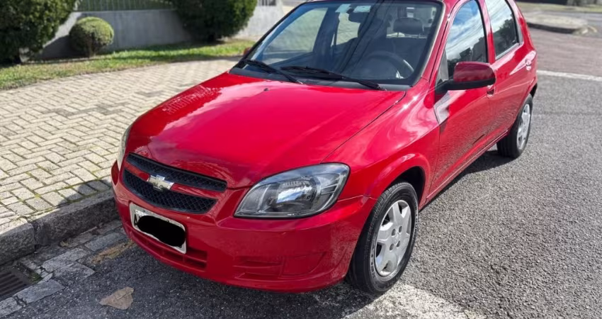 32.900,00 / CELTA LT 1.0 2013 VERMELHO c/ DIREÇÃO HIDRAULICA