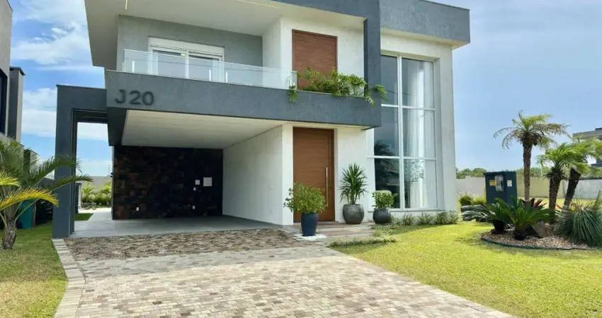Casa em condomínio fechado com 5 quartos à venda na Avenida Paraguassu, 1570, Capão Novo, Capão da Canoa