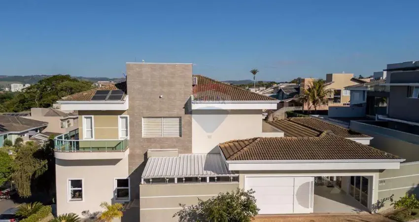 Casa com 4 suítes, espaço gourmet, estúdio, sauna e piscina no condomínio zurich dorf em valinhos/sp