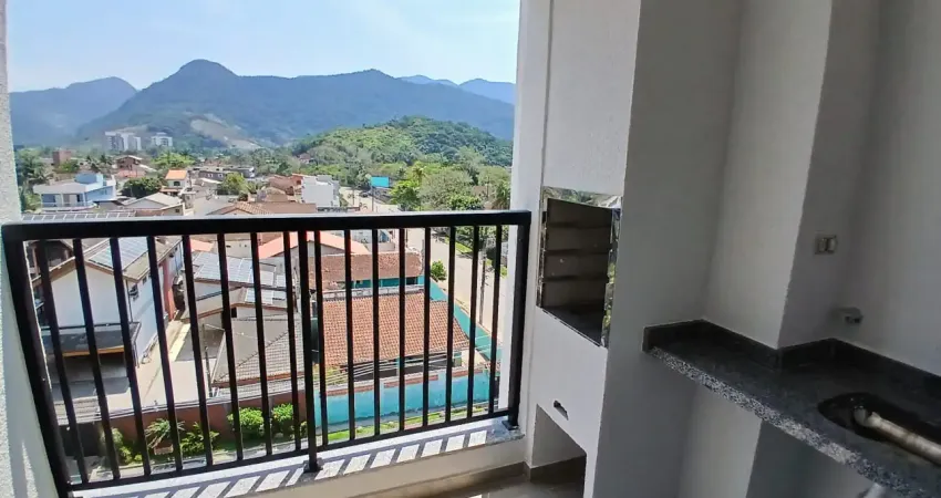 Apto pé na areia na Martim de Sá, 2 dorm, varanda gourmet, piscina e churrasqueira, 1 vaga, pronto para morar