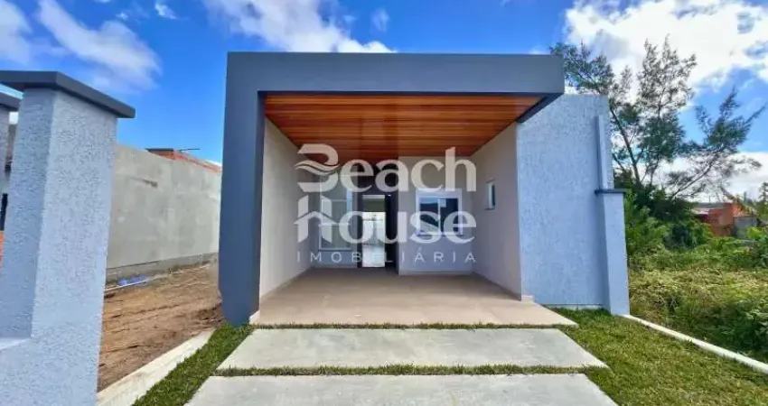 Encantadora casa com 3 dormitorios sendo uma suíte bem localizada no nova tramandaí!