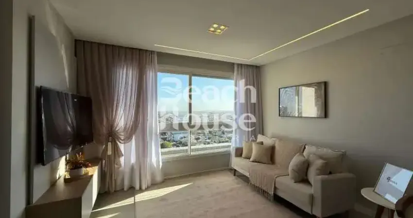 Apartamento finamente mobiliado e decorado! localizado do centro de tramandaí, próximo a todos comércios!