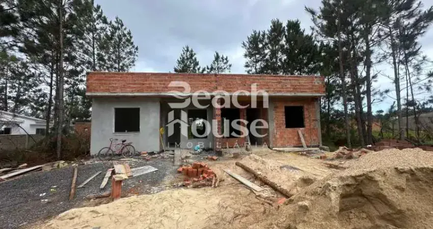 Geminada em fase de construção em nova tramandaí! com terreno nos fundos!