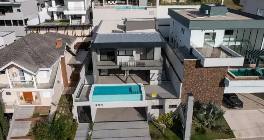 Oportunidade - casa em condomínio - residencial jaguary - 5 suítes - 458,24m².