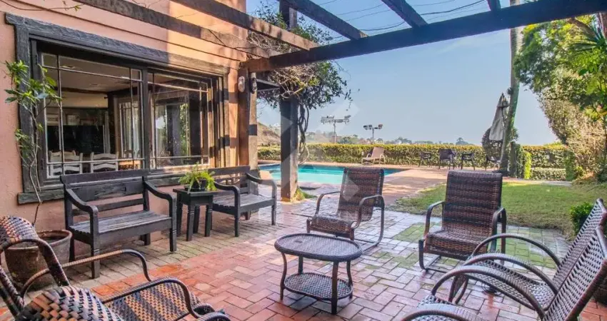 Casa em condomínio fechado com 5 quartos à venda na Rua Gilberto Laste, 90, Santa Tereza, Porto Alegre