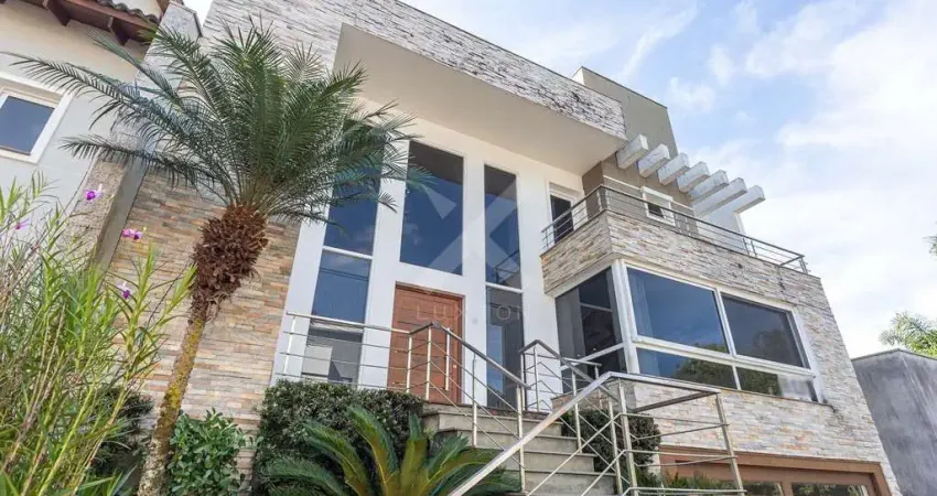 Casa em condomínio fechado com 4 quartos à venda na Rua Tocantins, 540, Agronomia, Porto Alegre