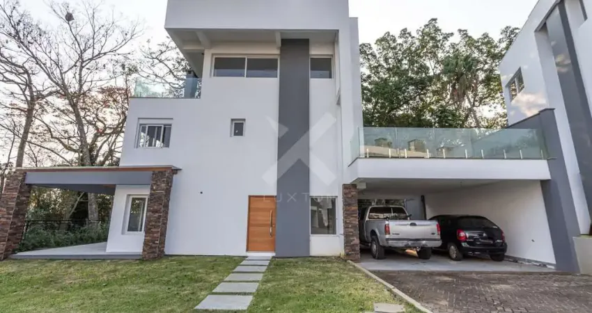 Casa em condomínio fechado com 3 quartos à venda na Avenida Coronel Marcos, 1239, Pedra Redonda, Porto Alegre