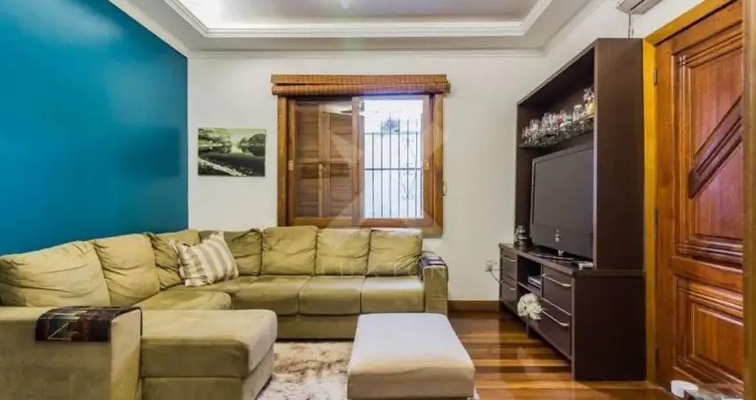 Casa com 5 quartos à venda na Rua Guilherme Schell, 161, Santo Antônio, Porto Alegre