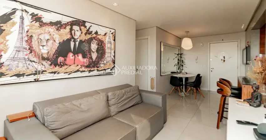 Apartamento - 2 dormitórios - suíte - andar alto - semi-mobiliado - 1 vaga coberta