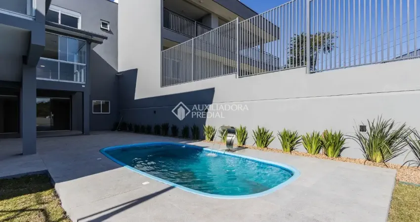 Sua casa dos sonhos no verdes campos — 3 suítes, piscina, pé-direito duplo e vista incrível em porto alegre