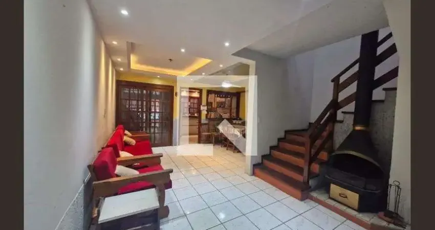 Casa com 4 quartos à venda na Rua Luiz Maestri, Guarujá, Porto Alegre