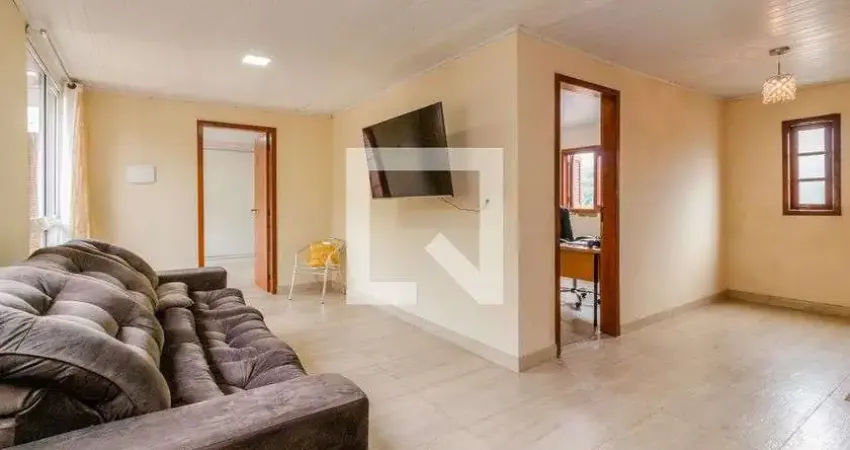 Casa com 4 quartos à venda na Rua Carijó, Vila Nova, Porto Alegre