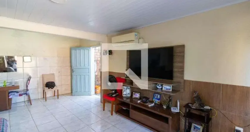 Casa com 3 quartos à venda na Rua Ozório José Martins, Campo Novo, Porto Alegre