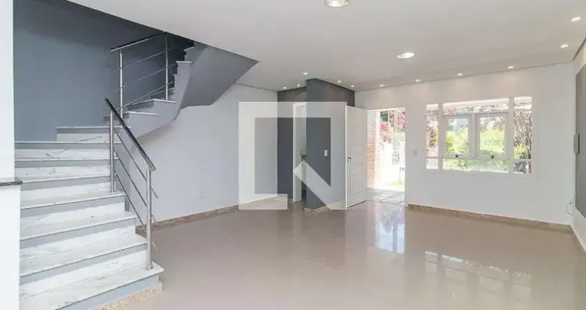 Casa com 3 quartos à venda na Rua Doutor Cláudio Walter Ferreira da Silva, Guarujá, Porto Alegre