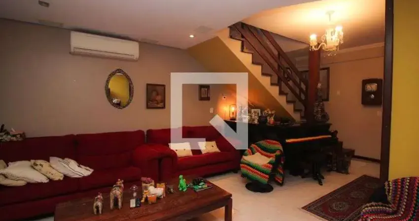 Casa com 3 quartos à venda na Rua Ponciano Pacheco da Silveira, Guarujá, Porto Alegre