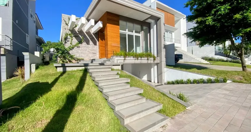 Casa térrea com 3 suítes no alphaville gravataí, 220m², garagem subterrânea