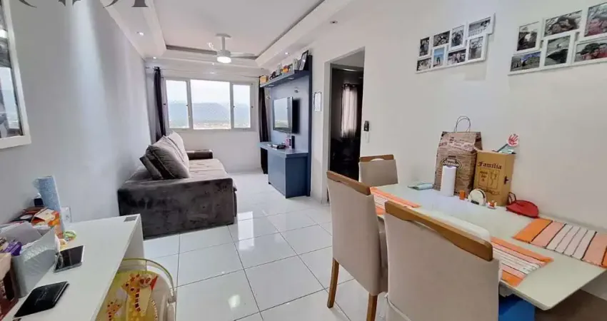 Apartamento à venda em praia grande-sp: 2 quartos, 2 salas, 1 banheiro, 1 vaga de garagem, 60m² no bairro nova mirim.