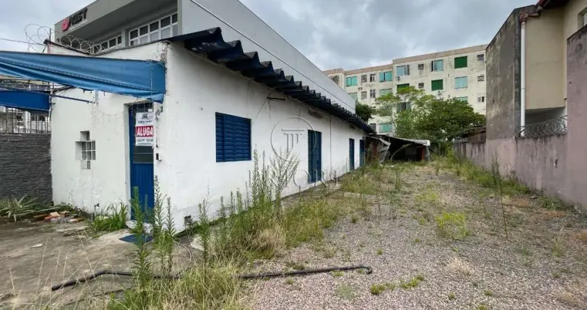Casa comercial com 3 salas para alugar na Rua Vinte e Cinco de Julho, 102, Santa Maria Goretti, Porto Alegre