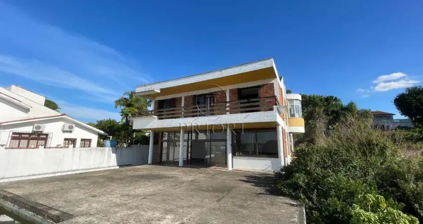 Casa com 4 quartos à venda na Rua Bororó, 520, Vila Assunção, Porto Alegre