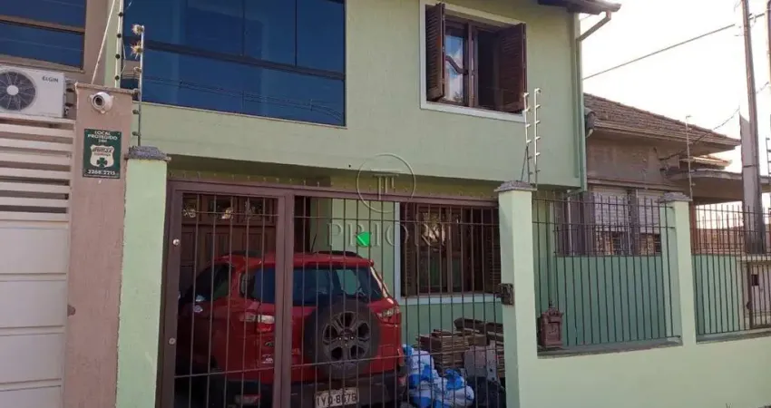 Casa com 4 quartos à venda na Avenida Polônia, 498, São Geraldo, Porto Alegre