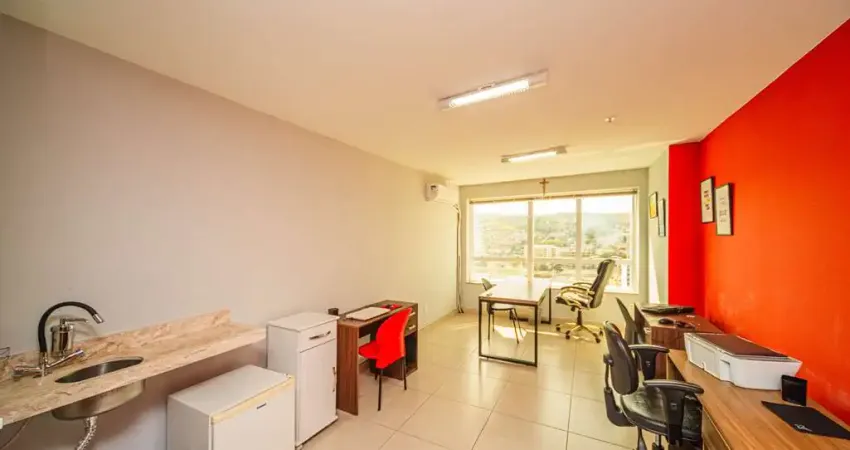 Sala em prédio moderno, com vaga rotativa e no centro para venda ou locação