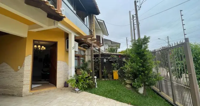 Casa em condomínio fechado com 3 quartos à venda na Rua Nevada, 33, Mato Grande, Canoas