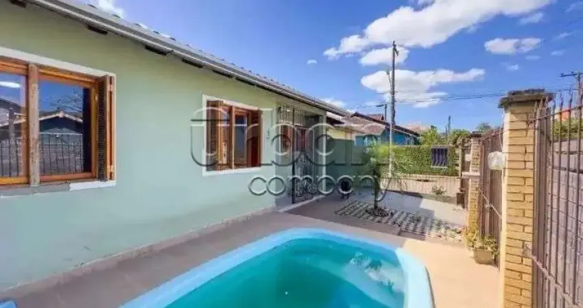 Casa em condomínio fechado com 3 quartos à venda na Rua Corujas, 437, Jardim Algarve, Alvorada