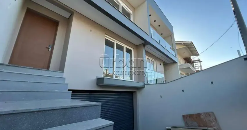 Casa em condomínio fechado com 3 quartos à venda na Rua Dinamarca, 233, Marechal Rondon, Canoas