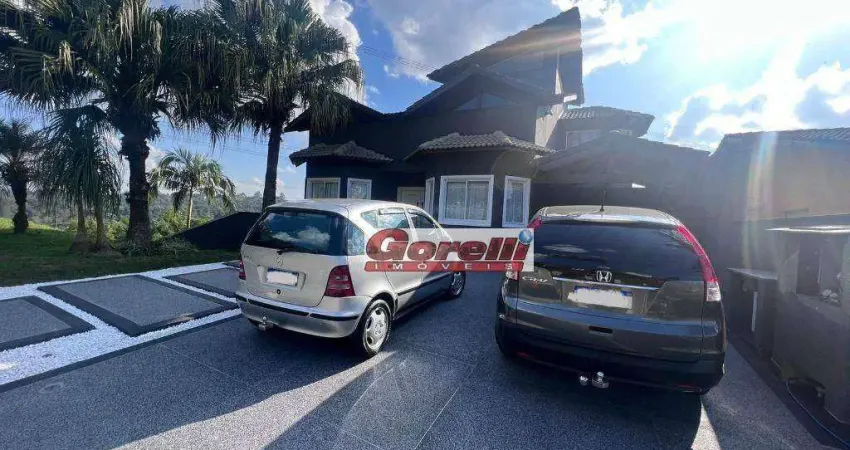 Casa com 4 dormitórios, 502 m² - venda por r$ 3.800.000,00 ou aluguel por r$ 14.000,01/mês - condomínio hills iii - arujá/sp