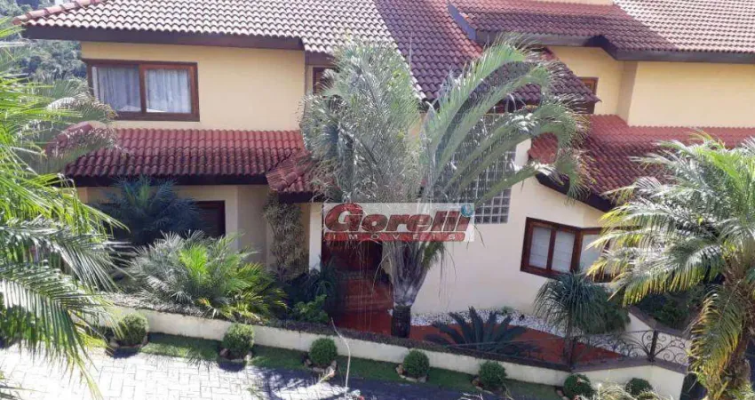 Casa com 3 dormitórios à venda, 619 m² por r$ 3.100.000,00 - condomínio hills iii - arujá/sp