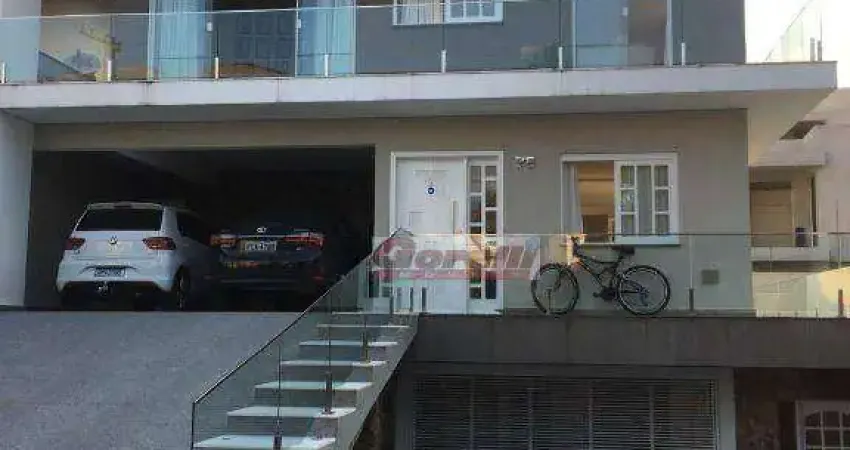 Casa com 3 dormitórios à venda, 489 m² por r$ 3.200.000,00 - condomínio arujá 5 - arujá/sp