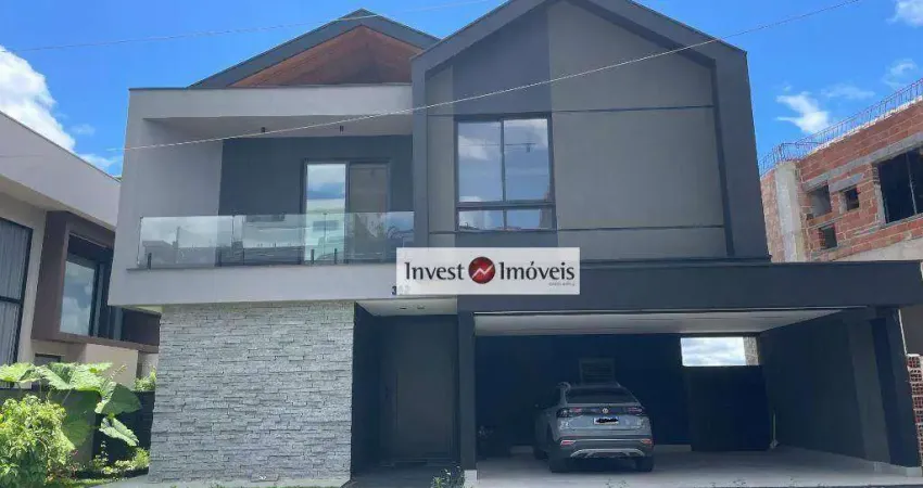 Sobrado com 4 dormitórios à venda, 400 m² por r$ 3.400.000,00 - condomínio residencial jaguary - são josé dos campos/sp