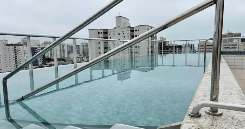 Apartamento 2 dormitórios 1 suíte na guilhermina, a 750m da praia por r$ 430mil